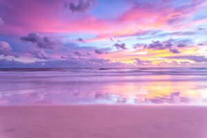 Pink sunrise over a beach, calming