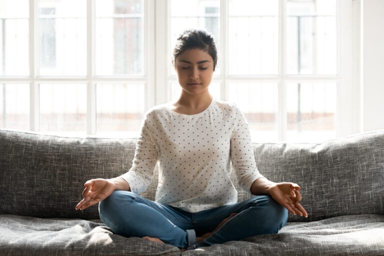 Full,Length,Mindful,Young,Indian,Woman,Making,Mudra,Gesture,,Sitting